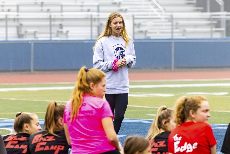 Olympian MacLean encourages campers to love running every day